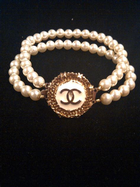 chanel buttons made into jewelry|repurposed button bracelet.